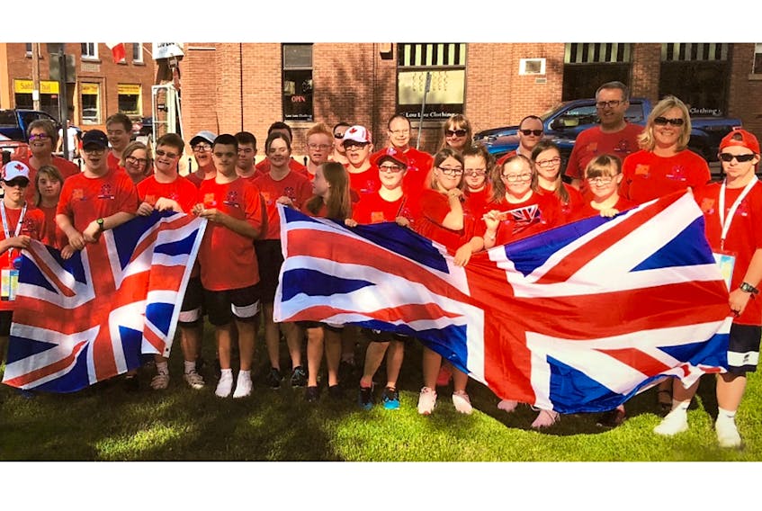 Swimmers from Great Britain express their gratitude.
