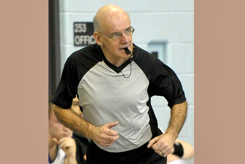 Keith Finck officiating a 2012 high school provincial championship game in Oxford.