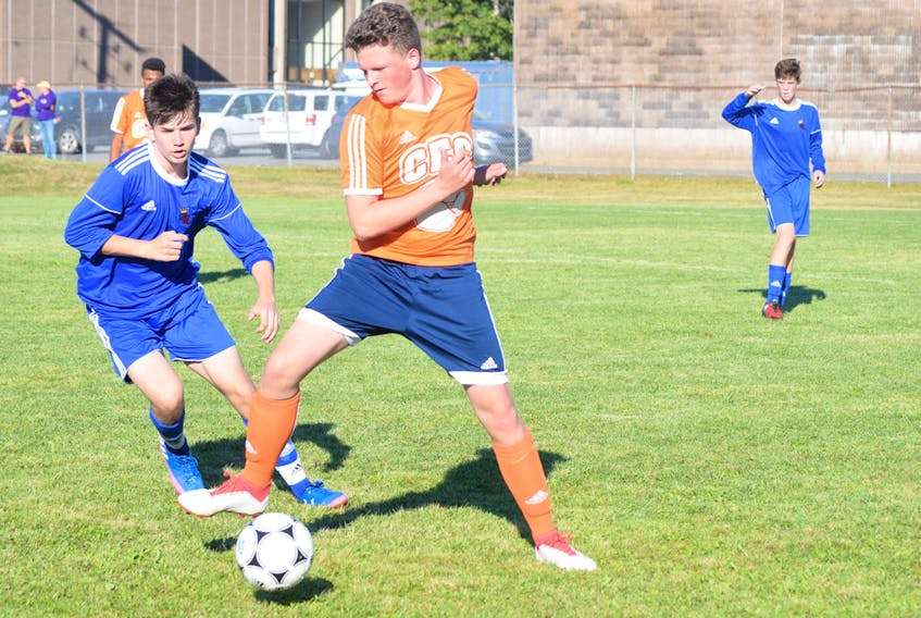 Tom Muller of the CEC Cougars make a play during recent high school boys soccer action against the Dr. JH Gillis Royals. The Cougars head to Hants East on Thursday, Oct. 4 for a game against the Tigers.
