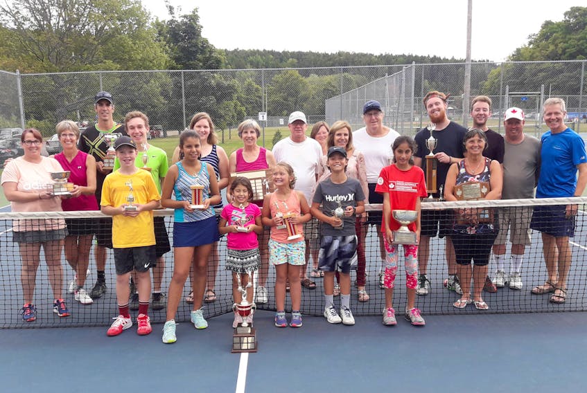 Truro Tennis Club picnic award winners are, front row, from left, Zach Verboom, Sofia Gonzalez, Lily Gonzalez, Joni Colburne, Caden Colburne and Meghna Anand; second row, Christine Chalmers, Jennifer Cameron, Francis Charest, Joel Richards, Joanna Burris, Shelley Flemming, Doug Edwards, Barb Moore, Nicole Bagnell, Jim Power, Leif Power, Denise Pelchat, Stephen Mallov, Sid MacIsaac and Don Cameron.