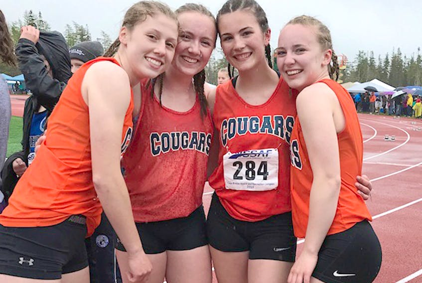 Members of the CEC Cougars intermediate girls relay team consisting of Leah Adams, left, Oula Maguire, Mykaela Sherry and Martina King were all smiles after winning the 4x100m final at the NSSAF track and field championship in Sydney last weekend.