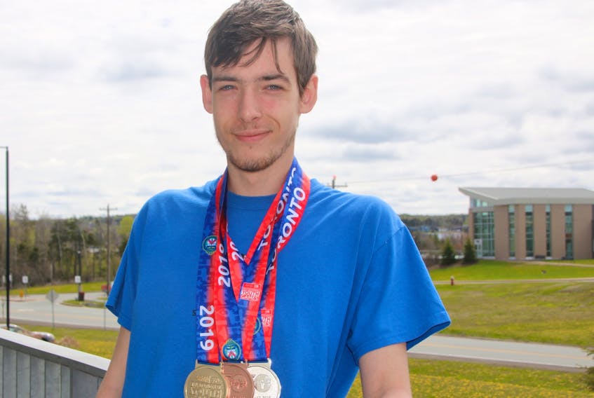 Jason Hicks took part in the first Special Olympics Youth Invitational Games, which were held in Toronto in May. He won three medals and set a personal best during the games.