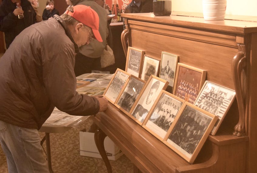 Danny Joseph looks over a display during a presentation on black hockey history at the Marigold Cultural Centre on Tuesday. 'Our Story: The History of Hockey and Truro's Black Community' focused on local black athletes who were overlooked for the colour of their skin.