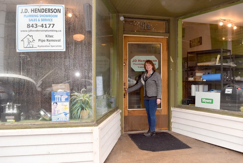 Gloria Henderson of JD Henderson Plumbing and Heating is ready to welcome customers to the company's new location at 914 Prince St., in Truro.