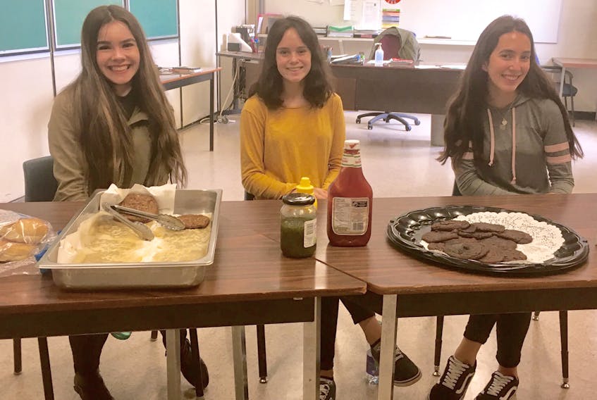 Cobequid Educational Centre students, from left, Zoe Morgan, Cameryn Mattie and Erin Shala help run a lunch program at the school three days a week. Food is prepared through the school’s Career Exploration Program.