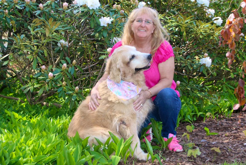 Karen Butt, president of Nova Scotia Golden Retriever and Friends Rescue, loves spending time with her own dog, Chelsea. The Truro Heights woman formed the non-profit group 11 years ago.