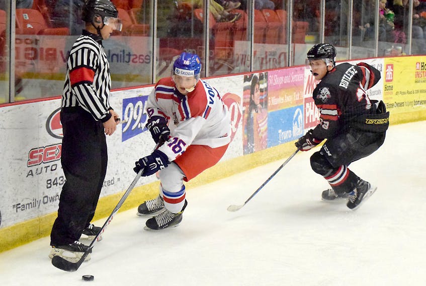 Thomas Vochozka of the Czech Republic shakes Graham Rutledge of the Truro Bearcats during World Junior Hockey Challenge pre-tournament game on Friday afternoon in Truro. Joey Smith/Truro Daily News