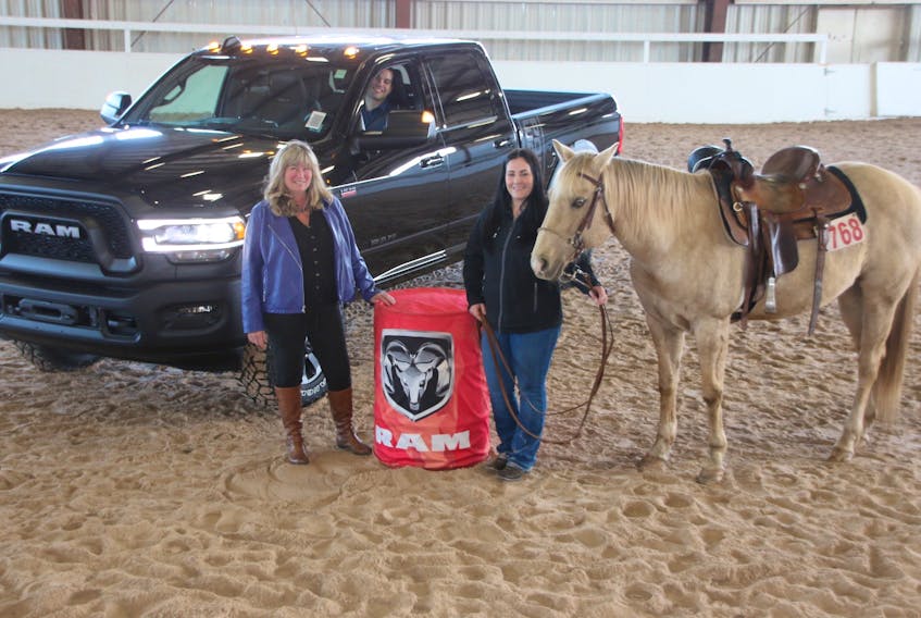 Preparations are underway for the 2019 Ram Rodeo Tour. Some of those involved are, from left, Darrelyn Hubley, Nova Scotia Provincial Exhibition manager, Daniel Morrison, of Blaikies Dodge Chrysler, Tracey Higgins, Maritime Barrel Racing Association president, and her horse Iza Wicked Wind. LYNN CURWIN/TRURO NEWS