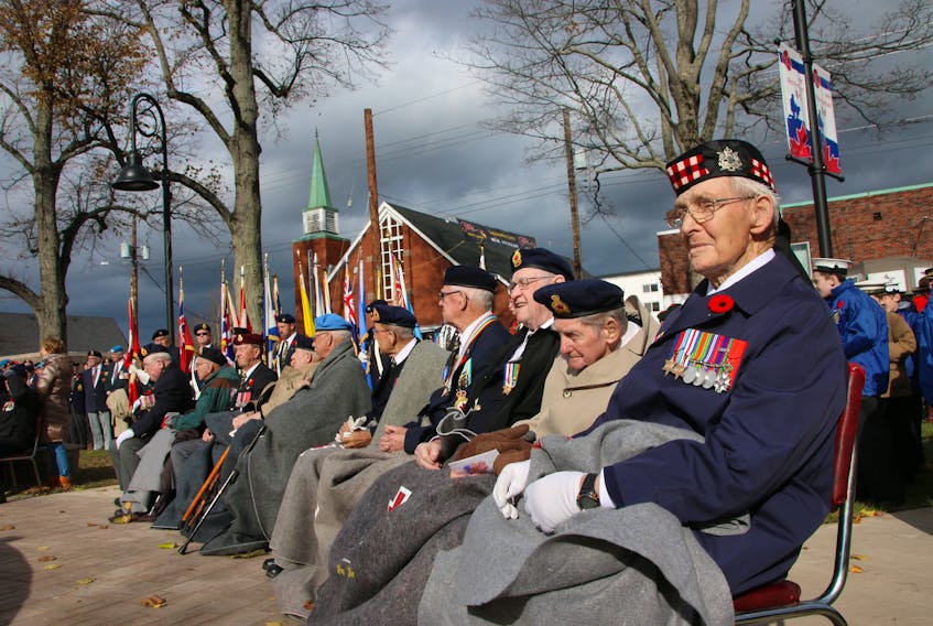 Aging veterans are seen participating in a past Remembrance Day service in Truro.