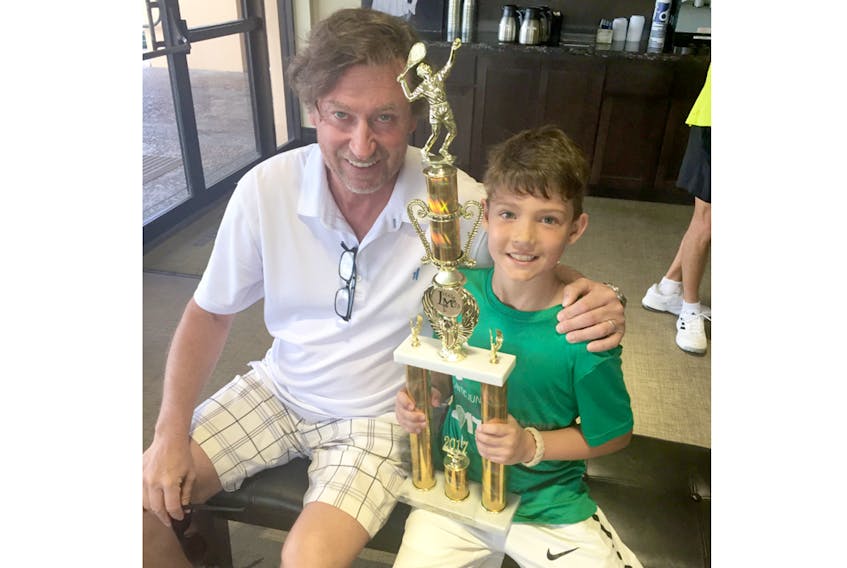 Truro's Caden Colburne had his picture taken with Wayne Gretzky after winning the runner-up trophy at an international tennis tournament in Florida. Gretzky’s daughter Emma also competed in the tournament. SUBMITTED
