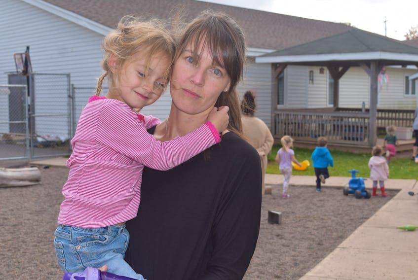 As both a parent and a board member of Near to Me Daycare, Christine Cutler, seen here with daughter Mallory, is saddened and worried about the facility’s pending shutdown if a new location cannot soon be found. The centre has been in operation since 1990.