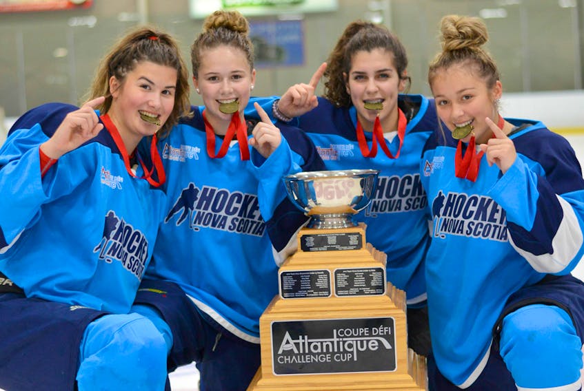 Onslow's Lindsay Smith, second from left, helped Nova Scotia’s U18 female hockey team win gold at the Atlantic Challenge Cup tournament last weekend in Moncton. Smith was one of four players from the Northern Subway Selects team on the gold medal-winning N.S. squad. Here, Smith celebrates the Cup win with fellow Selects, from left, Ella MacLean, Landyn Pitts and Eva Wornell.