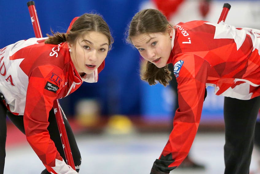 Cousins Karlee, left, and Lindsey Burgess will sweep stones against the top curlers in the world next later this month at the Canadian Beef Masters at the Rath-Eastlink Community Centre.