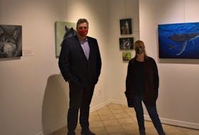 Truro artist Jen Power is joined by Garfield ‘Gar’ Moffatt, from gallery sponsor MacLellan & Moffatt Financial, for a look at Power’s exhibit East Coast Wildlife, which will hang until Jan. 29 at the gallery in the Marigold Centre.