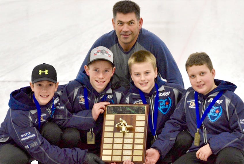 The Calen MacIsaac rink from Truro captured the recent Nova Scotia under-15 boys curling championship in Liverpool. Members of the team are, from left, Calan MacIsaac, Evan Hennigar, coach Craig Burgess, Owain Fisher and Christopher McCurdy.