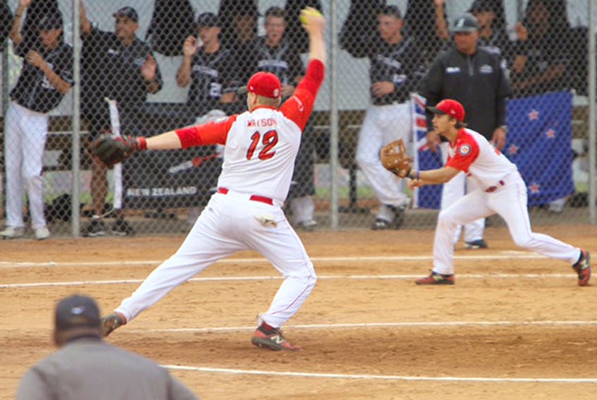 David Watson of Milford delivers from the rubber during action at the world junior men's softball championship in Prince Albert, Sask. Watson and his Canadian teammates finished fourth at the tournament.
