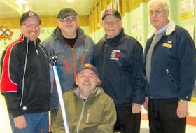 Front row, wheelchair curler Troy Peck; second row, Chuck Patriquin, Neil Peck, Ted Lohnes and Bill Spinney.