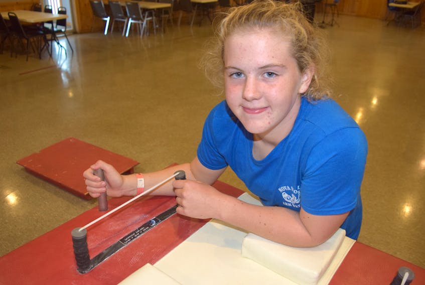 Karina Warren, 12, has made great strides in arm wrestling since becoming involved in the sport last April. Next month, she will travel to Turkey to compete in the world championship. Karina trains on Thursdays at the Truro Horsemen’s Club as a member of the Truro Arm Wrestling Club.