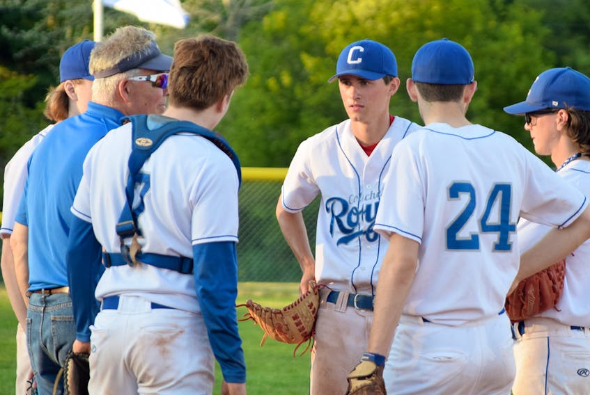 Rowan Sears, middle, shown here with the Colchester Royals, will play for Canada at the world junior men's fastpitch championship.