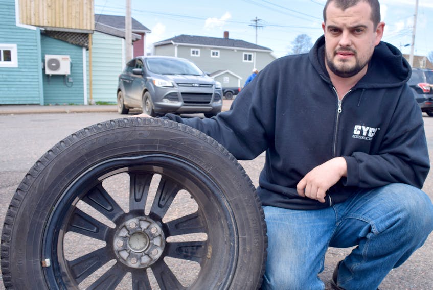 After destroying a $1,200 rim on his vehicle when he struck an unmarked pothole on Robie Street, Matthew McLellan feels the Department of Transportation and Infrastructure Renewal is shirking its responsibility by refusing to compensate him for the loss.
