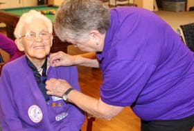 Mary Beckett looked very pleased as Darlene Duggan, provincial Trefoil Guild liaison, prepared to fasten a pin recognizing 60 years of involvement with Guiding.
Lynn Curwin/Truro Daily News