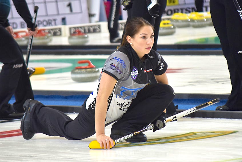 Karlee Burgess watches intently to see the result of a rock she has thrown in quarterfinal curling action at the Canadian Beef Masters event Saturday. After an impressive run through round-robin play, Burgess and her team mates were defeated 7-3 and were eliminated from further competition.