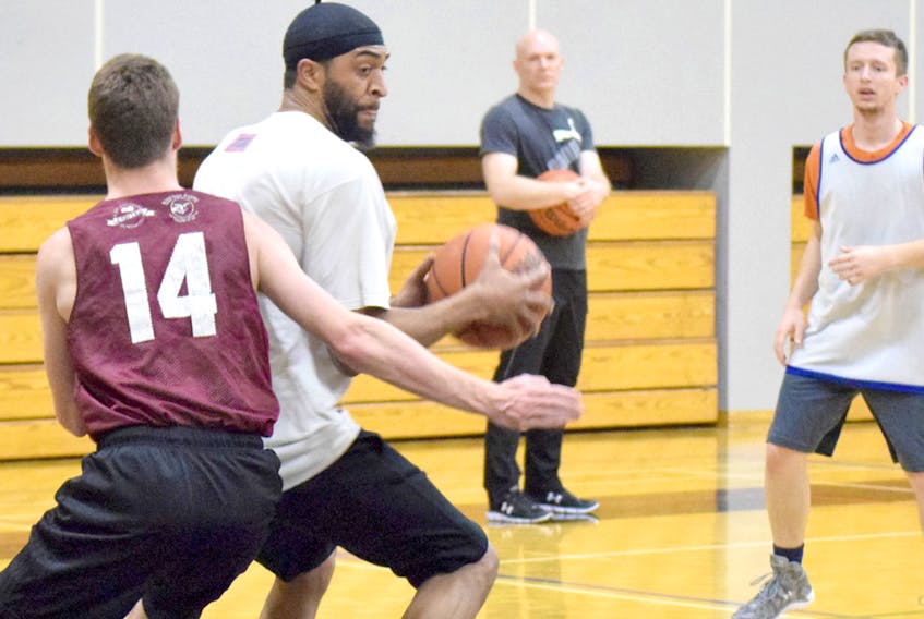 Robin Grouse, with the ball, and his Dal AC teammates were busy this week preparing for Friday's ACAA men's hoops quarterfinal against the Crandall Chargers. The teams meet at the Langille Athletic Centre at 3 p.m.