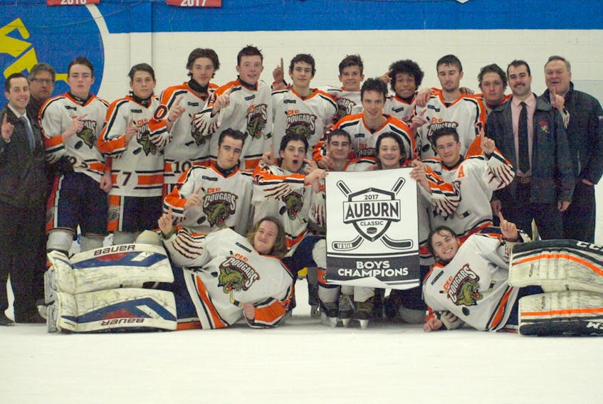 The CEC Cougars went undefeated to win gold at the Auburn Classic boys’ high school hockey tournament. Members of the Cougars are, front, from left, Cody Patriquin and Steven Jackson; second row, Aiden Pitcher, Cody MacDonald, Brody Schmitt, Connor Miller and Weston Porter; third row, coaches Tom Whidden and Jeff Hazelton, Rylan McIntyre, Joseph Fagioli, Ryan Rath, Calum MacLeod, Hayden Roy, Cameron DeGroot, Luke Smith, Brayden Gray, Kyle Stuart, Keegan Grady and coaches Andre Robichaud and Vince MacCormack. Absent are Jackson Haight, Matt Melanson and Jeremy O'Connell.