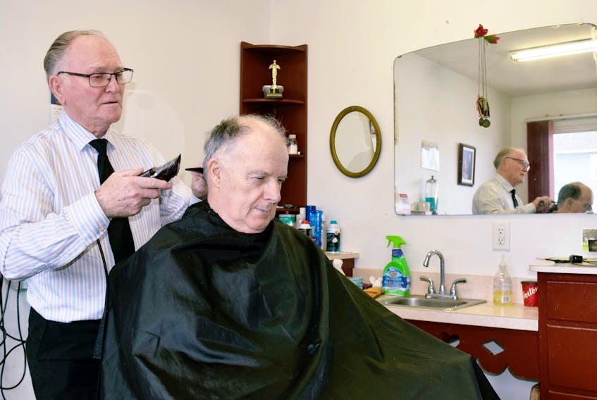 Bible Hill barber Harry McNutt has been cutting hair for just shy of 60 years for longtime customers and friends such as Ben Neil. McNutt has been Neil’s barber for about 20 years.