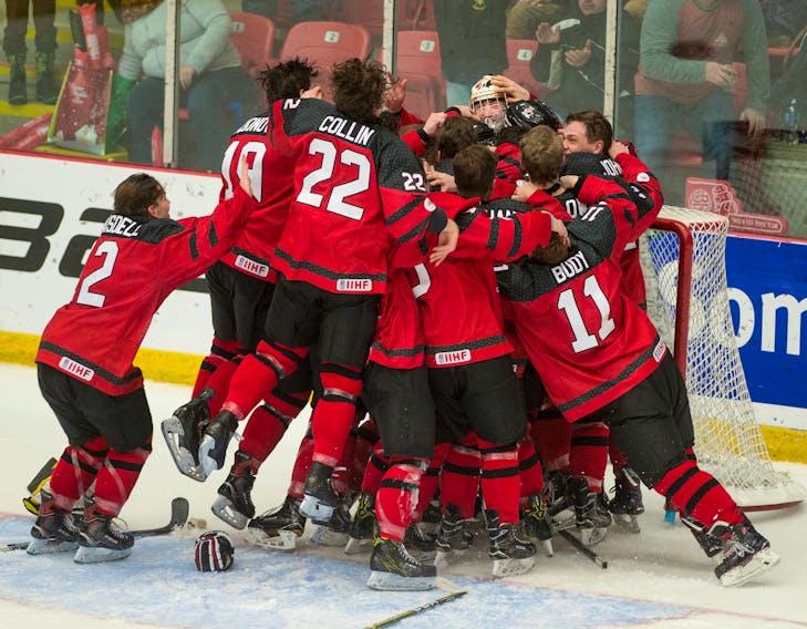 Members of Canada West celebrate their gold medal victory at the 2017 World Junior A Challenge Saturday, after beating Team USA 5-1 in the championship game at the Rath-Eastlink Community Centre. Netminder Zach Rose, seen at right with forward Brett Stapley was named the game’s Most Valuable Player. A capacity crowd turned out to cheer the Canadians on. 
MARK GOUDGE - SALTWIRE NETWORK