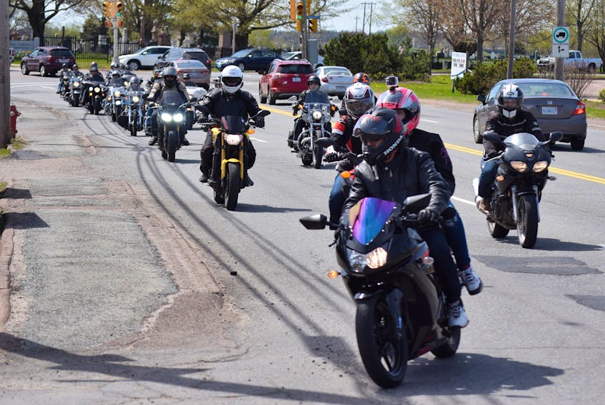 After their ride, a long stream of bikers poured into the BellyUp parking lot to enjoy an afternoon of live music, food and a silent auction held to raise money for BACA.
