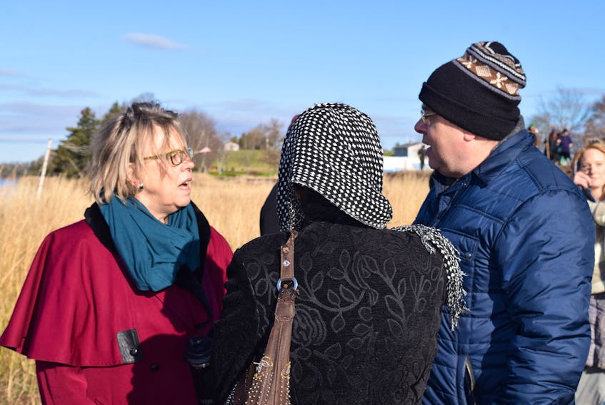 Elizabeth May, left, federal leader of the Green Party and her provincial counterpart Thomas Trappenberg, right, spoke with people during a visit Friday to the site of the Alton Natural Gas Storage project in Fort Ellis. 
BY HARRY SULLIVAN – TRURO DAILY NEWS