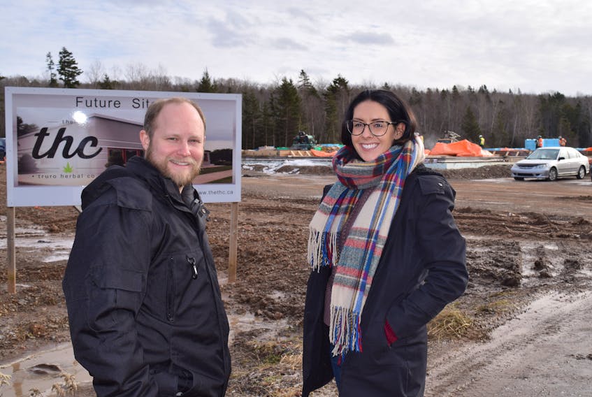 Evan Price, president and CEO of the Truro Herbal Company and Emily McDade, assistant director of Quality Assurance, are happy to see construction of their new 20,000-sq.-ft. production and research facility underway in the Truro Business Park. The facility is expected to be in operation by the spring.
BY HARRY SULLIVAN - TRURO DAILY NEWS