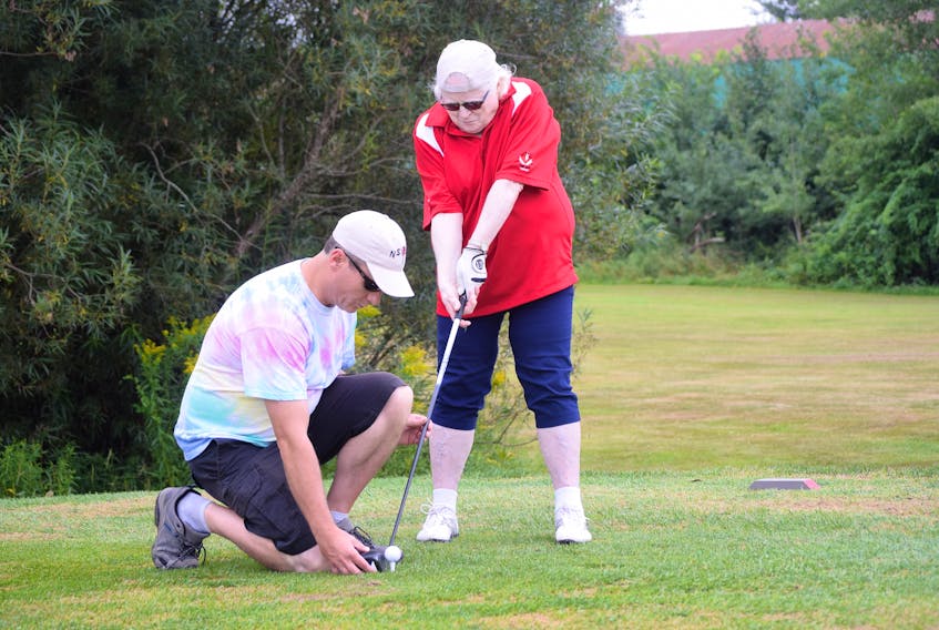 Saskatchewan’s Judy Ursulan is one of the leading players in the ISPS Handa Canadian Open Blind Golf Championships, leading the females as of Thursday evening. Her son Keith serves as her coach. On Wednesday, when this picture was taken, golfers completed a practice round.