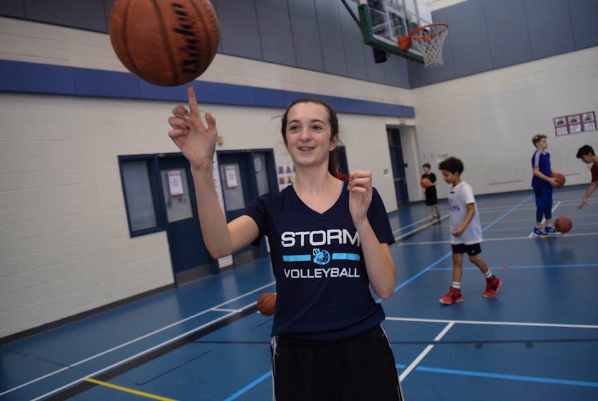 Player Lily Cormier can spin a basketball on her fingertips – a hard-earned skill for even the most experienced players. She was at the Knights of Columbus Basketball Free Throw Contest in Valley on Jan. 19.
