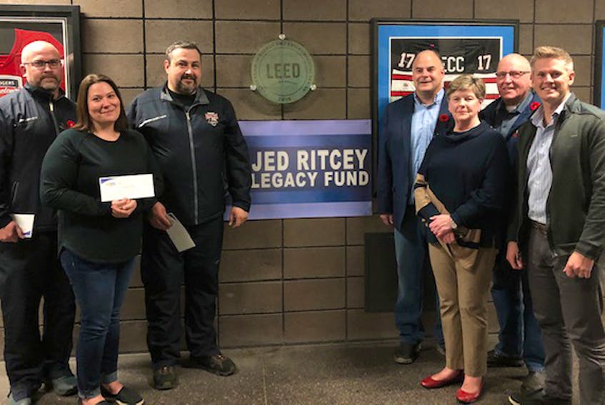 Three local minor hockey associations are benefitting from the Jed Ritcey Legacy Fund. On Tuesday, Nov. 5, association reps gathered with board of directors and family members to receive their cheques. From left, Matthew White (South Colchester Minor Hockey Association), Jenny Ives (Tatamagouche Minor Hockey Association), Mark Collins (Truro Minor Hockey Association), Betty Ritcey (Jed’s wife), Dave Ritcey (Jed's son) and committee members Bob Taylor and Matt Moore. CONTRIBUTED