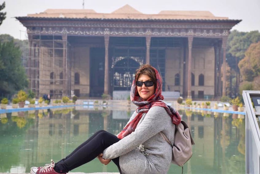 Truro resident Flora Riyahi visited her birth nation of Iran just before Christmas. Here, she is pictured outside the Chehel Sotoun (Forty Columns) palace in Esfahan, built nearly 400 years ago. Donald Trump threatened to bomb Iranian cultural sites as tensions between Iran and the United States have increased.