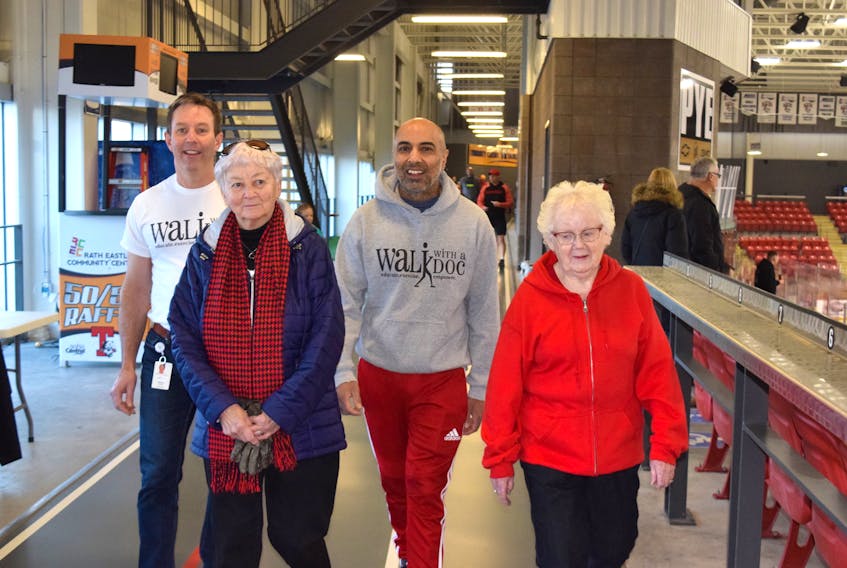 Walk with a Doc runs every Saturday morning in the Rath Eastlink Community Centre. The Jan. 4 walk brought people young and old onto the walking track, where they learned about healthy, active living. From left: Dr. Stephen Ellis, Carol Smith, Raj Makkar and Annie Archibald.