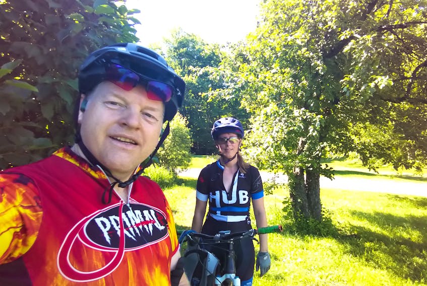 Bruce MacPherson and his wife Kim are avid mountain bikers from Valley who have cycled all over North America. Here they are in Vermont.