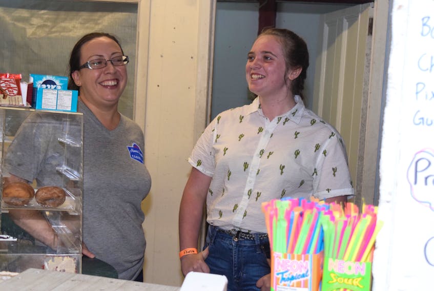 While often busy, there is often time for sharing light-hearted moments. Crystal Crossan-Zak, left, often enjoys a good joke with Caitlyn Spence. FRAM DINSHAW/TRURO NEWS
