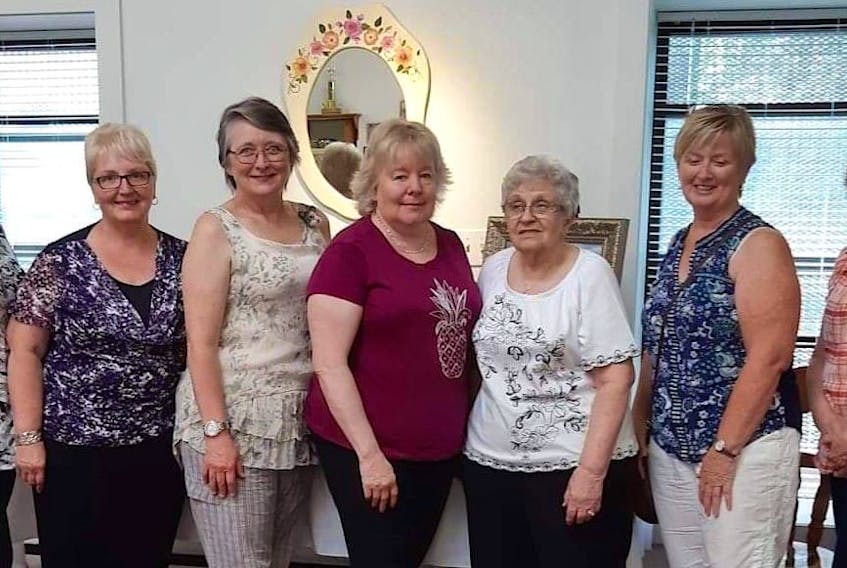 Members of the New Waterford Painters Club presented their first group show at the New Waterford Seniors and Pensioners Club during Coal Dust Days. From left, Beth Boudreau, Becky Smith, Marilyn Kalbhenn, Beverly Devoe, Julie Gaetan, Leanna Burchell and Terri Jenkins. Also part of the group is Nancy Brewer. CONTRIBUTED 