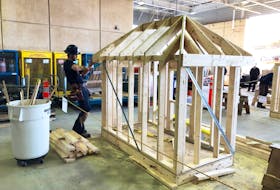 Pomquet’s Tanner Doiron in the midst of building his play house at the Nova Scotia Skills Competition, held in Halifax April 5. Doiron won gold at the event and will now compete in the nationals, also in Halifax, later this month.