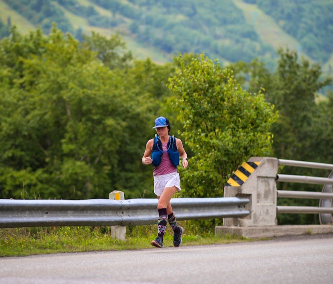 Tanya Joy runs along the road portion of a gruelling 100-kilometre run near the Humber Valley Resort and Steady Brook on Sept. 5. The Steep100 race was cancelled due to COVID-19, but Joy decided to do the course  anyway, the only one who did, competing it in 14 hours and 20 minutes. While the Steep 100 course does include roads, much of it involves trails and features nearly 5,000 metres of elevation gain, with eight peaks of 300 or more metres. — CONTRIBUTED PHOTO