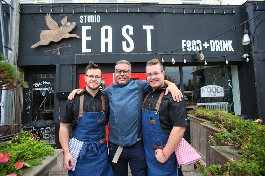 Studio East restaurant owner Ray Bear, centre, has sold his restaurant to Pratt brothers, Andre and Guy, seen at the restaurant in Halifax, on Friday, Nov. 1, 2019.
