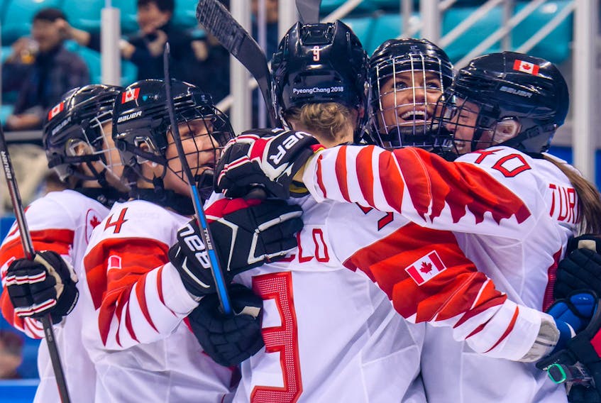 Members of the Canadian Olympic women's hockey team celebrate after taking a 2-0 lead during Monday's game against Olympic Athletes of Russia (OAR.) Canada won 5-0 and will meet the US for the gold medal game. Taken from @TeamCanada Twitter.