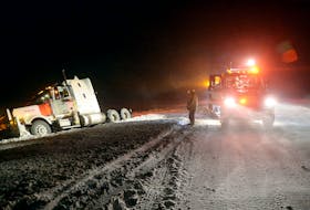 A transport truck went off the T.C.H. Friday night in an area near Butter Pot Park notorious for blowing and drifting snow. Keith Gosse/The Telegram