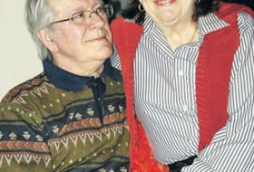 Kitty Walsh and her husband, Terry, are shown in their St. John’s home in 2011.