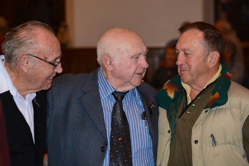 (From left) Hilton McNutt, who was a draegerman in the 1958 Springhill Bump, speaks with survivor Harold Brine and Bill Kempt, whose late father survived the disaster. during a hymn sing at St. Andrew’s-Wesley United Church in Springhill on Oct. 23 – the 60th anniversary of the disaster that took the lives of 75 coal miners.