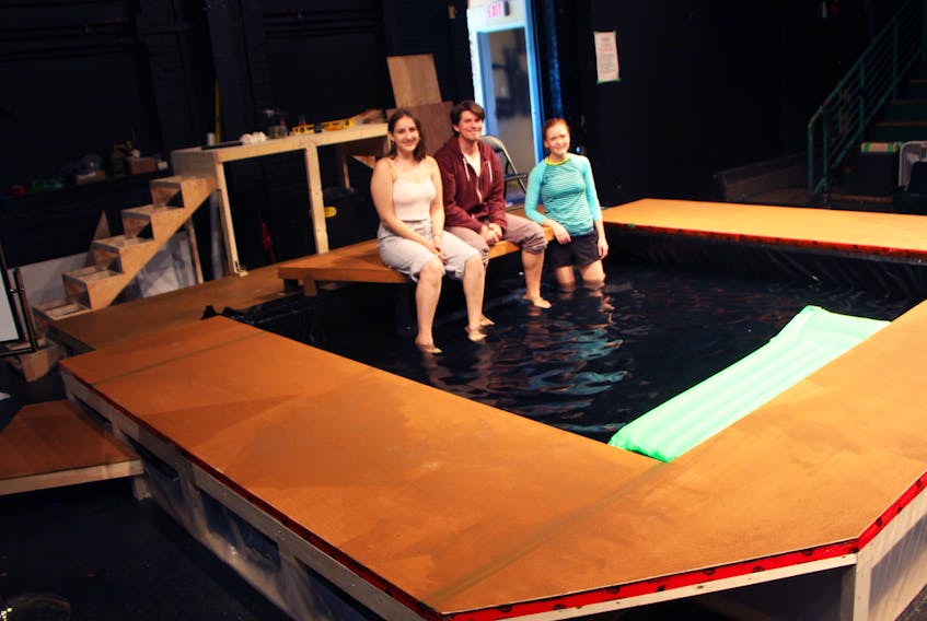 Theatre Antigonish actors Madison Kendall (left) and Brendan Ahern are joined by stage manager Ashley Pettipas in the pool constructed, on the Bauer Theatre stage, for the play Metamorphoses which runs from Nov. 7 to 10, as well as Nov. 17 and 18.