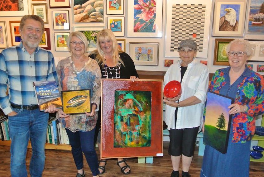 Partners in the Tidnish Bridge Art Gallery including (from left) Harry Thurston, Cathy Thurston, Diana Vertis McIsaac, Melanie Landau and Laurell Hamilton are celebrating the gallery’s 10th anniversary. There will be an open house and celebration on July 6 that will include music by Truro pianist Merv Henwood. It will also coincide with the 39th Tidnish Festival.
